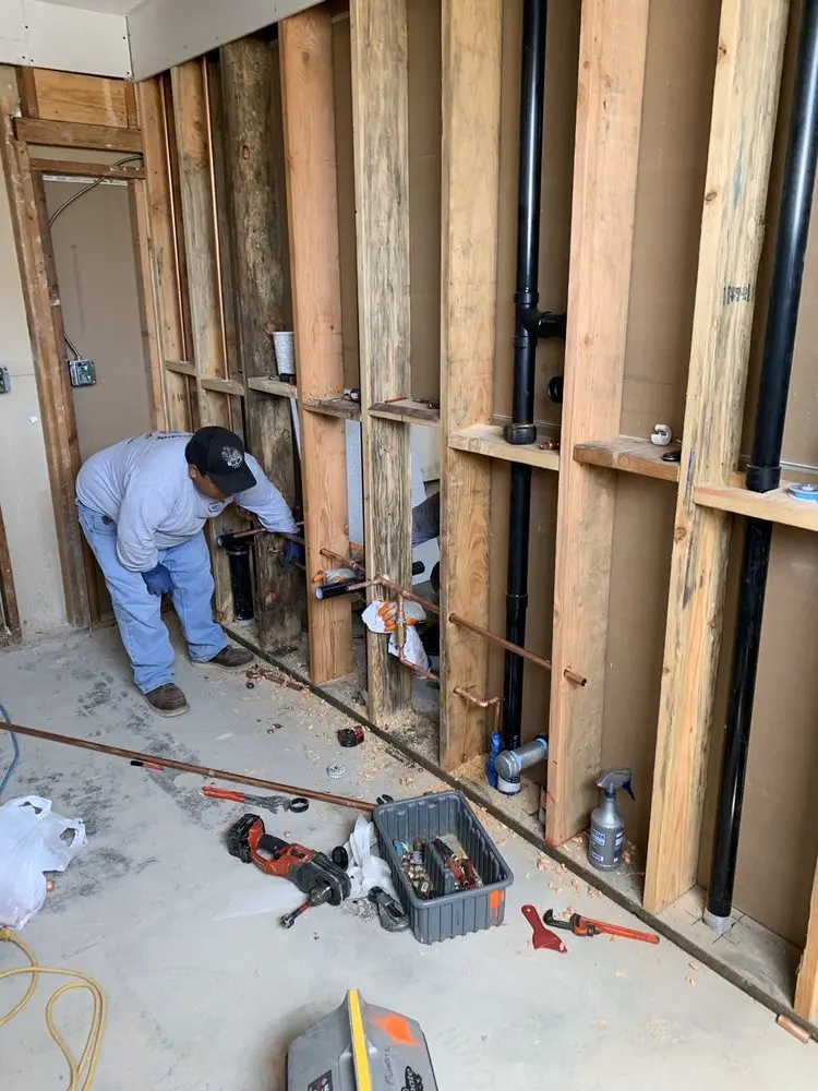 Commercial rough-in plumbing for Water Heater Replacement in Central Village